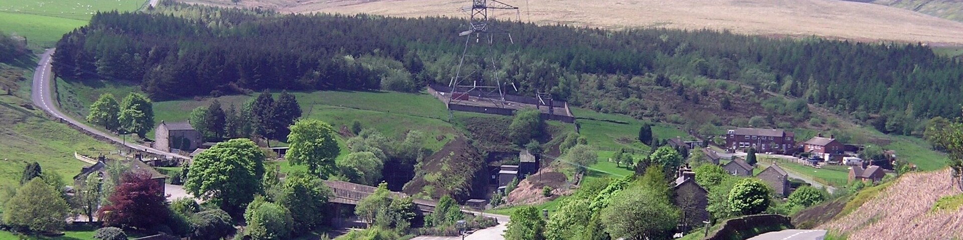 Dunford Bridge South Yorkshire, In the centre can be seen the old sealed up entrances to the Woodhead rail tunnels. The road to the left is called Windle Edge and leads to the A628 Sheffield to Manchester Road.