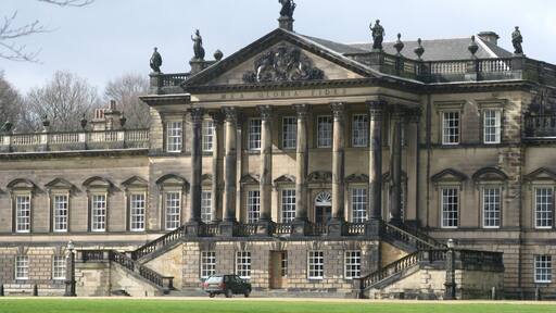 Wentworth Woodhouse is a Grade I listed country house near the village of Wentworth, in the vicinity of Rotherham - its East Front, 606-foot (185 m) long, is the longest country house façade in Europe. The house includes 365 rooms.