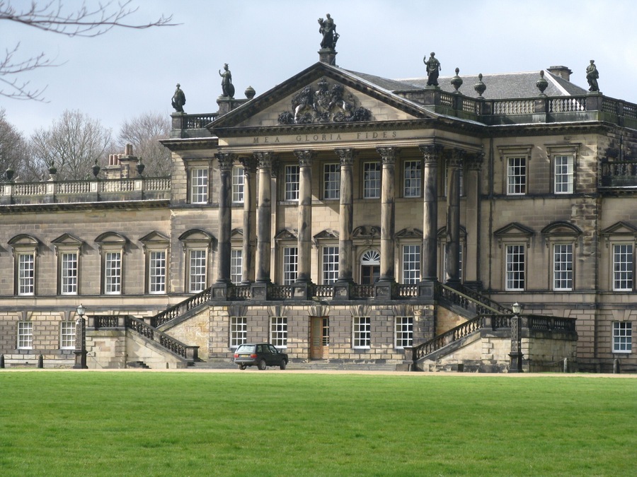 Wentworth Woodhouse is a Grade I listed country house near the village of Wentworth, in the vicinity of Rotherham - its East Front, 606-foot (185 m) long, is the longest country house façade in Europe. The house includes 365 rooms.