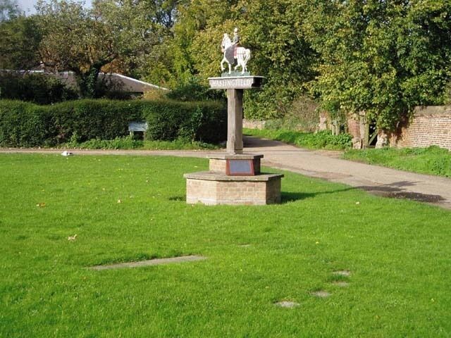 Haslingfield village sign and Millennium Sundial. The plaque on the sign is an explanation panel for the sundial, subject of a supplemental image.