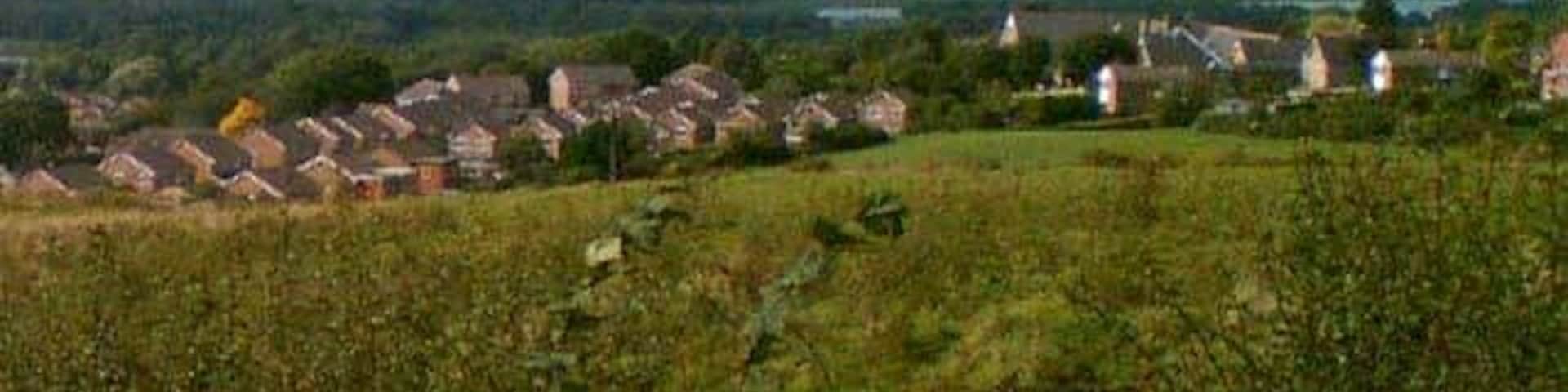 Long Lane, Killamarsh. View NNW from Long Lane, Killamarsh across Killamarsh village. The lakes and woodland in the mid-distance are Rother Valley Country Park.