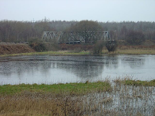 Thrybergh Bridge This carried the former Great Central and Midland Railways' joint line across the River Don. The pool in the foreground is probably the result of mining subsidence.