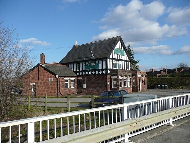 The Star Inn, Batley Road, Kirkhamgate Named on the six-inch map of 1854, although obviously rebuilt since then, probably in the first half of the 20C when the half-timbered style was in fashion. The railings and crash barrier are for the bridge over the M1.