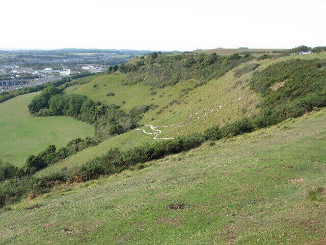 The escarpment of the North Downs. Part of the White Horse in 1274796 is visible on the hillside.