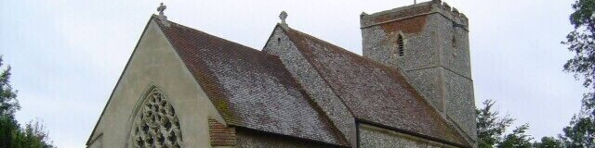 Church of England parish church of St Mary, Reed, Hertfordshire: view from the north-east, showing the chancel east window, which has five lights and reticulated tracery.