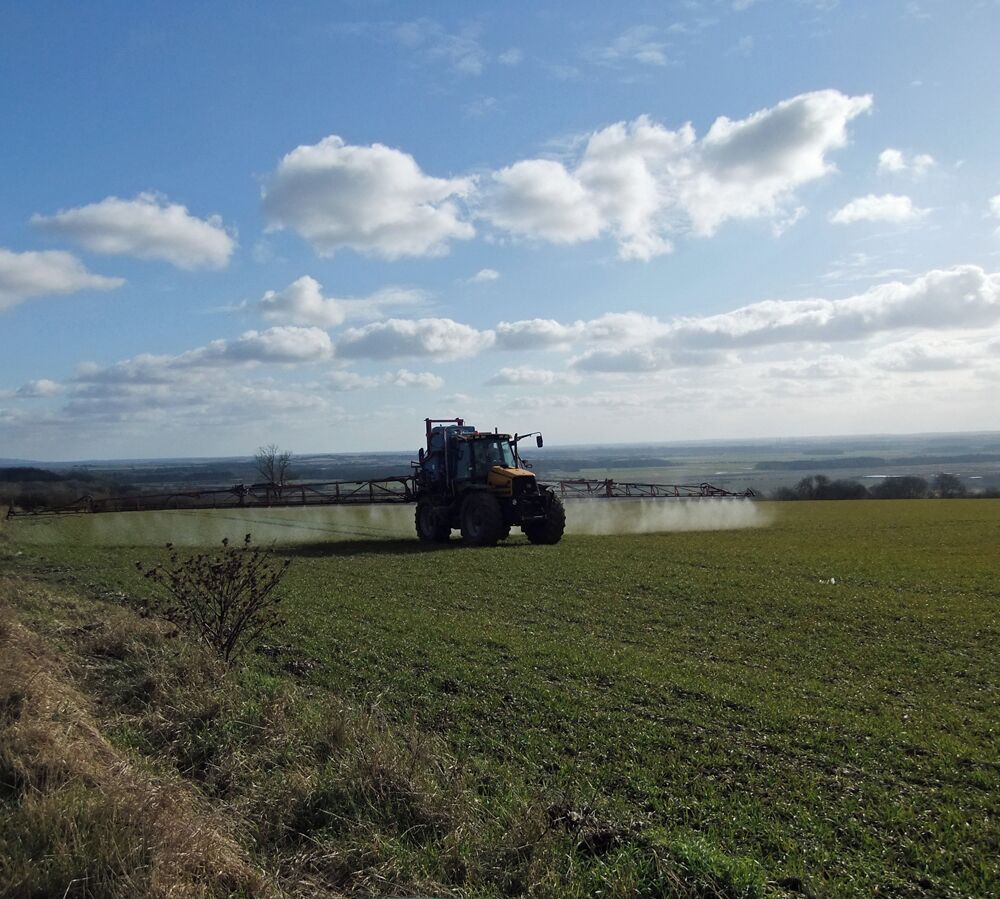 Spraying Winter Wheat near Worlaby. Photo taken from Middlegate.