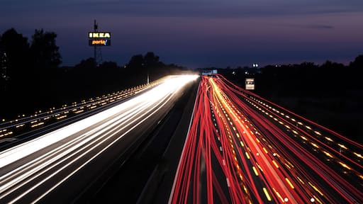 Bundesautobahn 2 near Braunschweig (Brunswick), Germany. The yellow speckles are caused by the flashing lights of transports with oversized loads and their pilot cars.