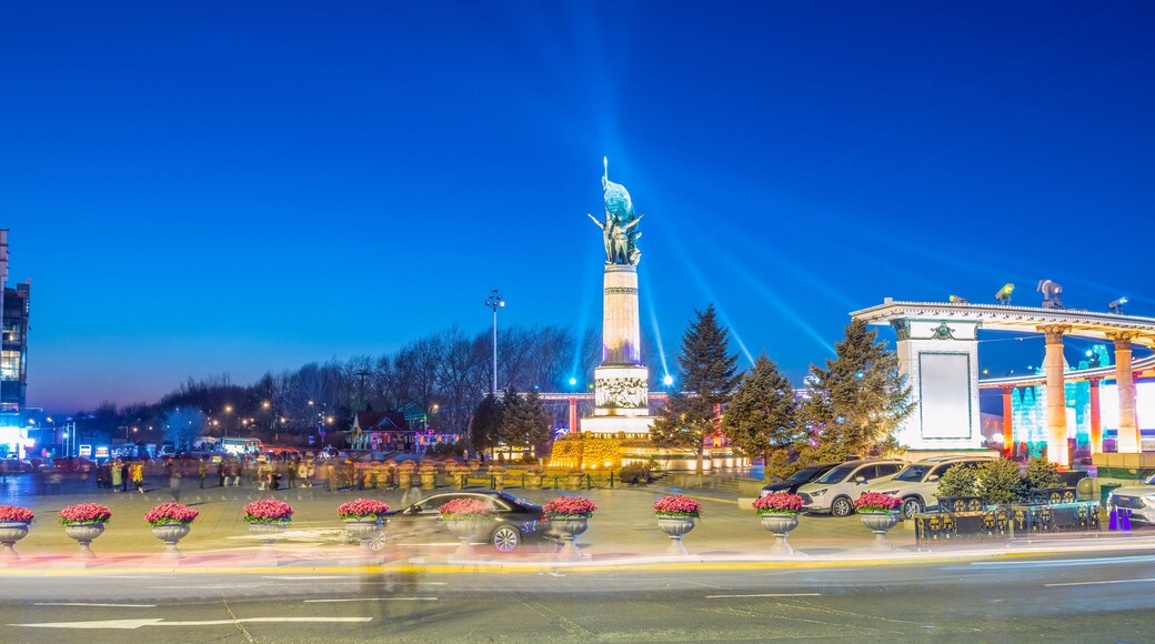 Cityscape of Harbin. Flood control monument, tourists are visiting. Located near Central Avenue (Zhongyang Street), Harbin, Heilongjiang, China.