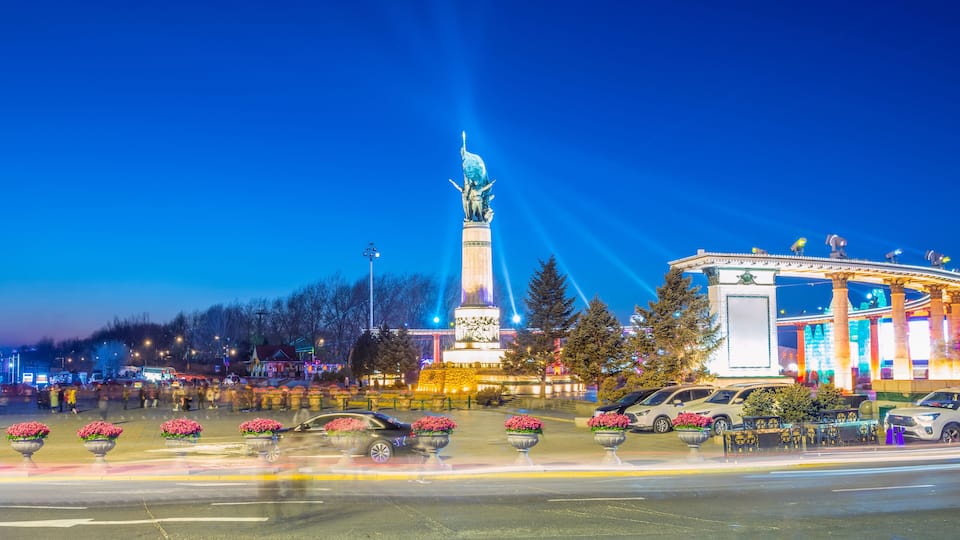 Cityscape of Harbin. Flood control monument, tourists are visiting. Located near Central Avenue (Zhongyang Street), Harbin, Heilongjiang, China.