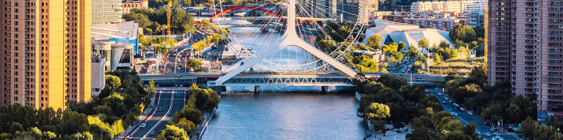 High angle view of the city scenery and Tianjin Eye Ferris Wheel on the Haihe River in Tianjin, China.