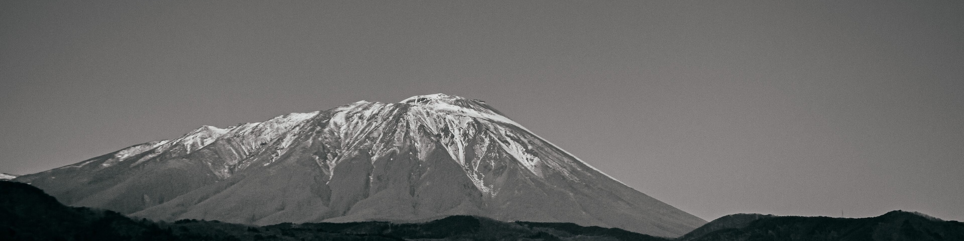 Snow covered Mount Akita Komagatake and local town view from Kakunodate