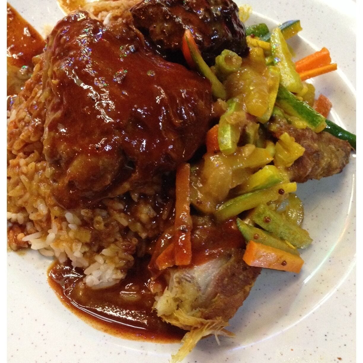 If you like spicy rice give this #Nasi Lemak Royale a try. Choose your own dishes from the many choices available. It's very similar to Nasi Kandar from Penang. 