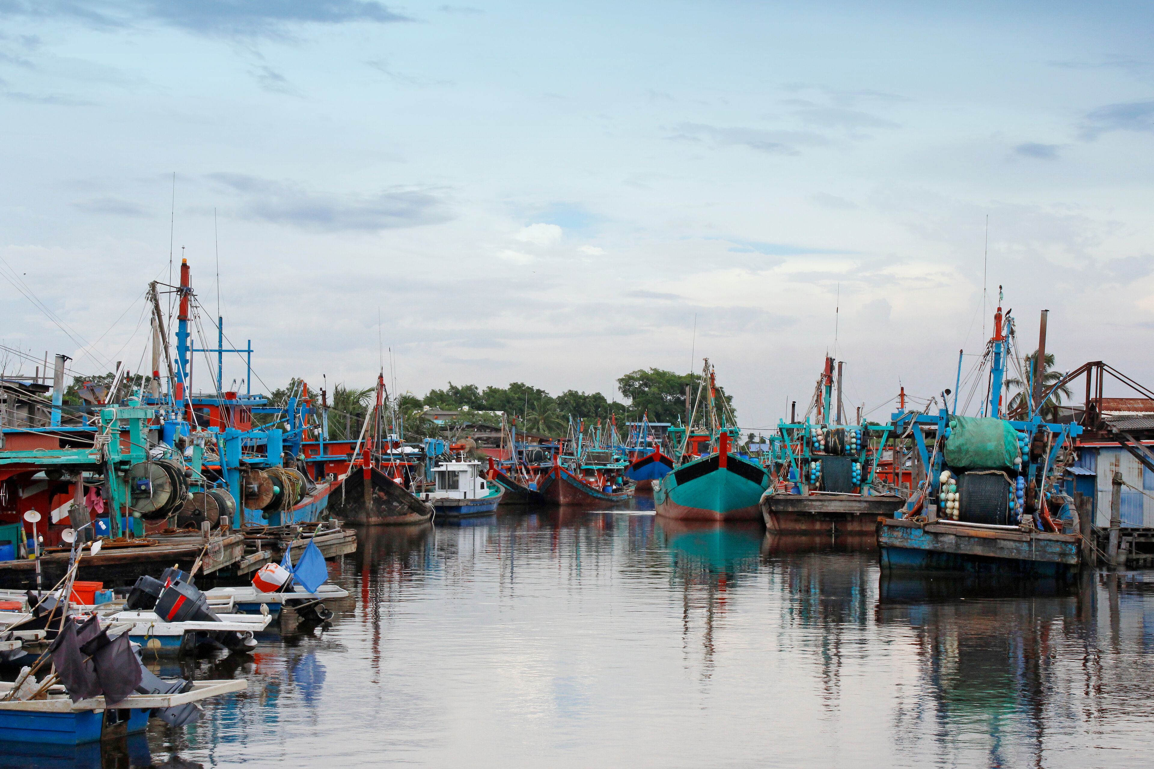 Fishing boats along the river at Bagan, Sekinchan, Kuala Selangor, Malaysia