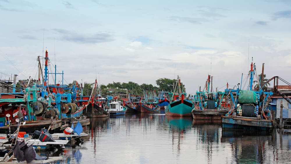 Fishing boats along the river at Bagan, Sekinchan, Kuala Selangor, Malaysia