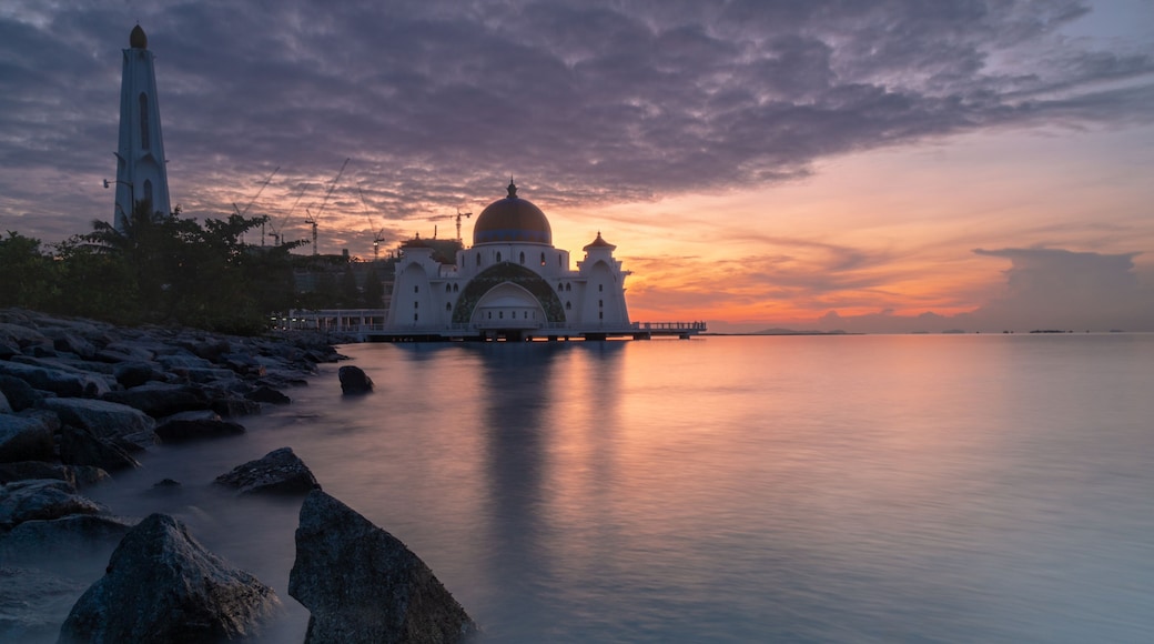 beautiful sunrise at malacca straits mosque