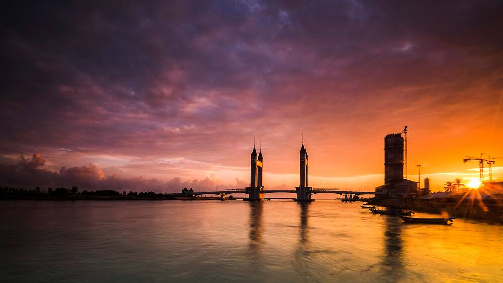 Beautiful Terengganu Draw Bridge during sunrise. The newly minted bridge provides road connection between the mainland Kuala Terengganu and Seberang Takir. Image contains excessive noise