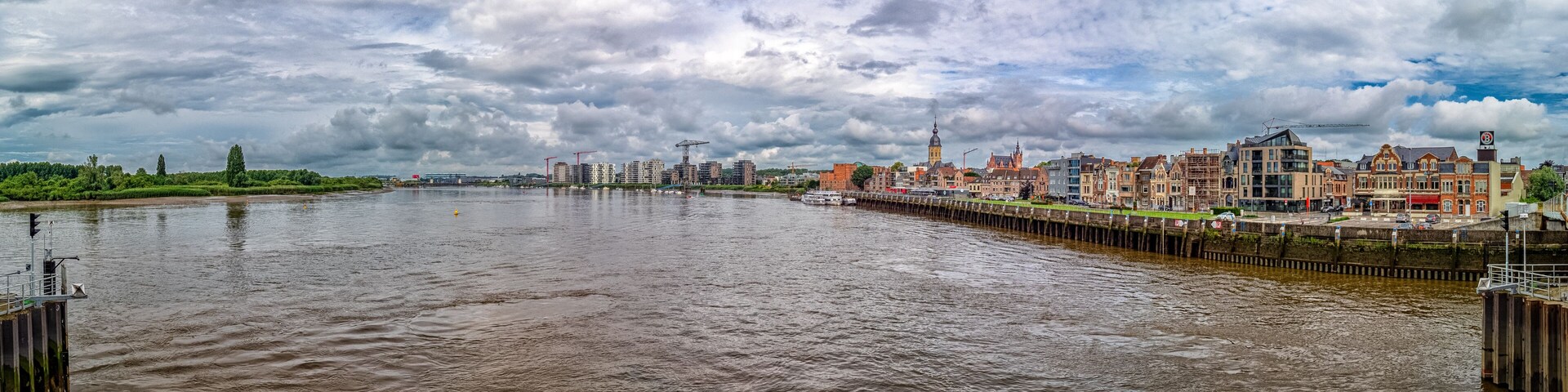 Schelde (river) near Temse - Cloudy Day Over River And City