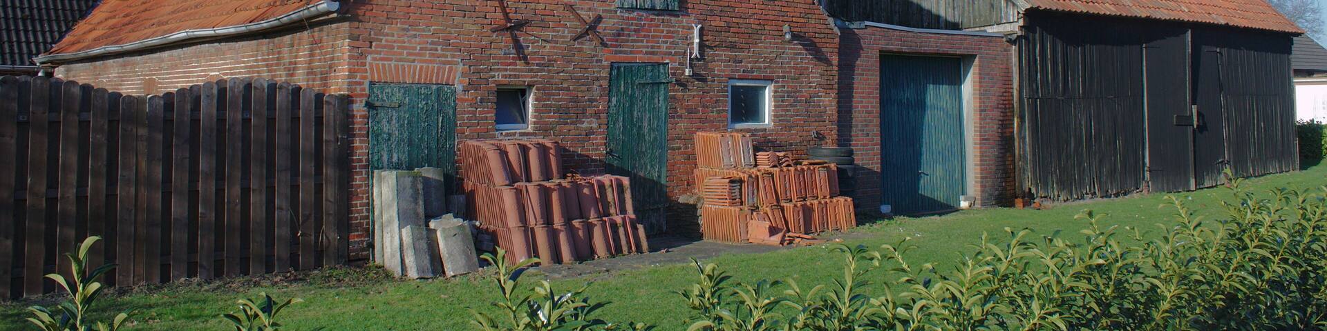 Barns remaining of a farm in Petersfehn I village, Bad Zwischenahn municipality, Lower Saxony, Germany.