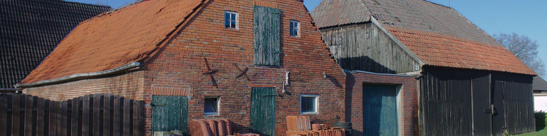 Barns remaining of a farm in Petersfehn I village, Bad Zwischenahn municipality, Lower Saxony, Germany.