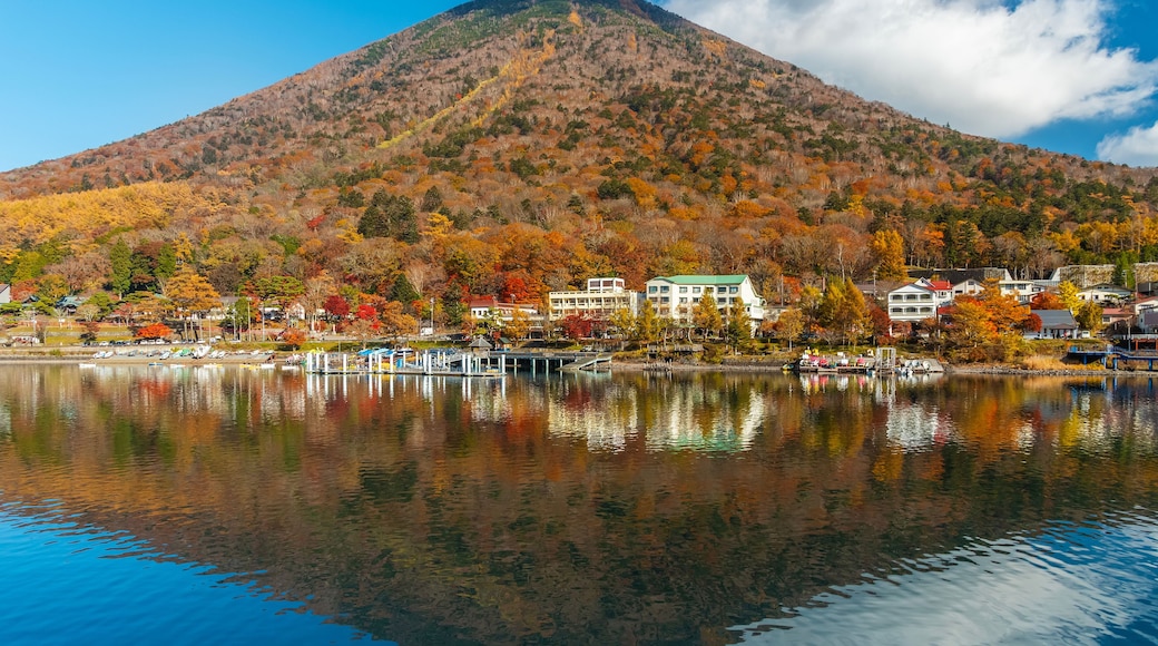Idyllic landscape of lake Chuzenji and mountain Nantai in Nikko national park, Japan