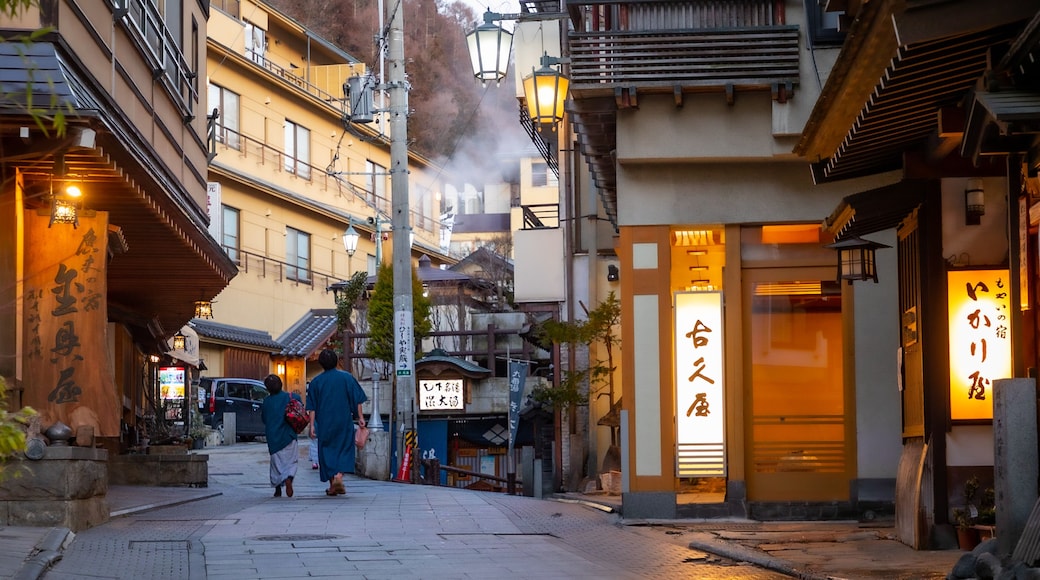 Yudanaka Shibu Onsen which includes signage and street scenes as well as a family