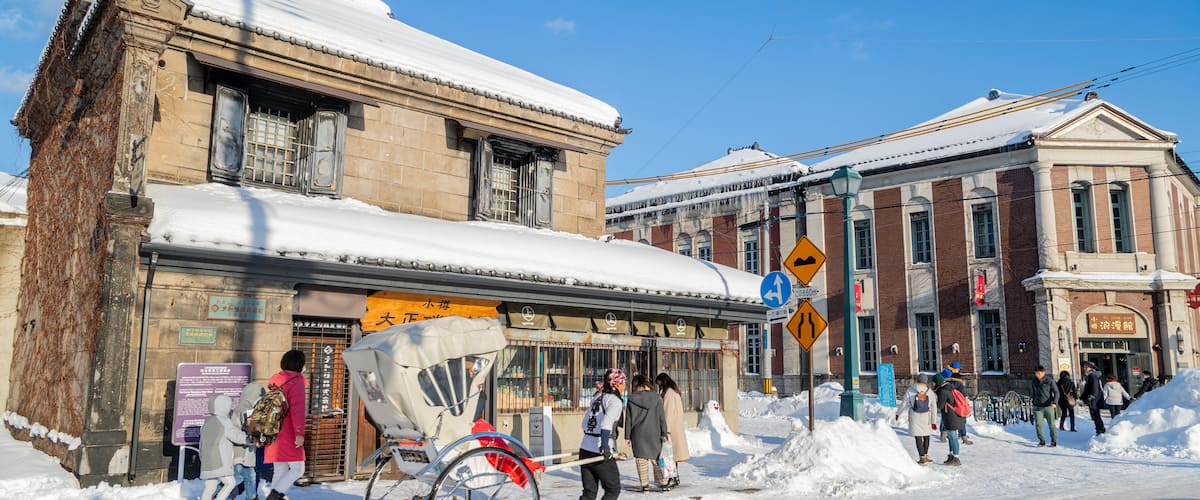 Sakaimachi Street which includes snow and street scenes