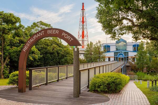Kirin Beer Village which includes signage and a bridge