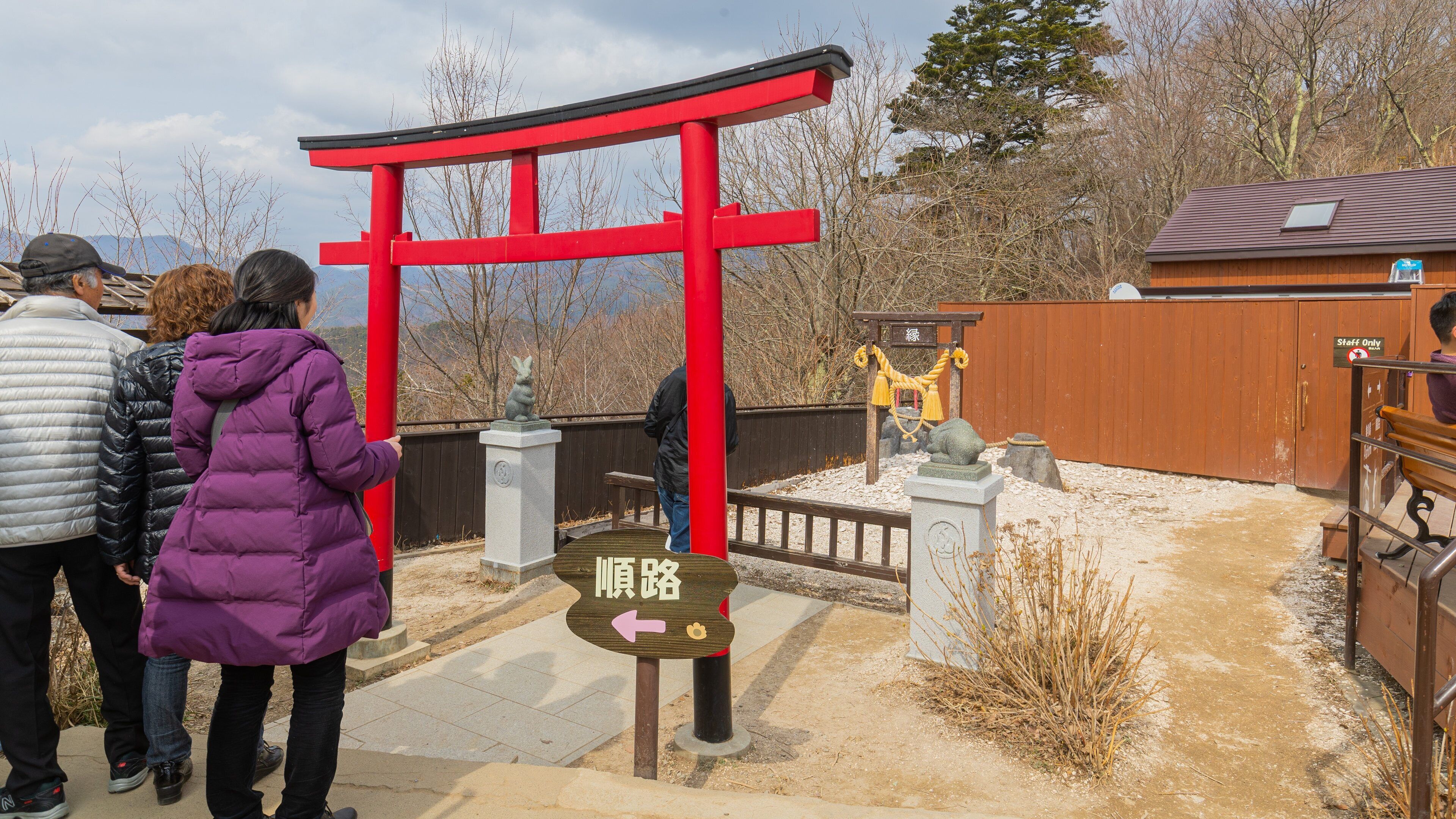 Mt. Kachi Kachi Ropeway featuring heritage elements and a garden as well as a small group of people