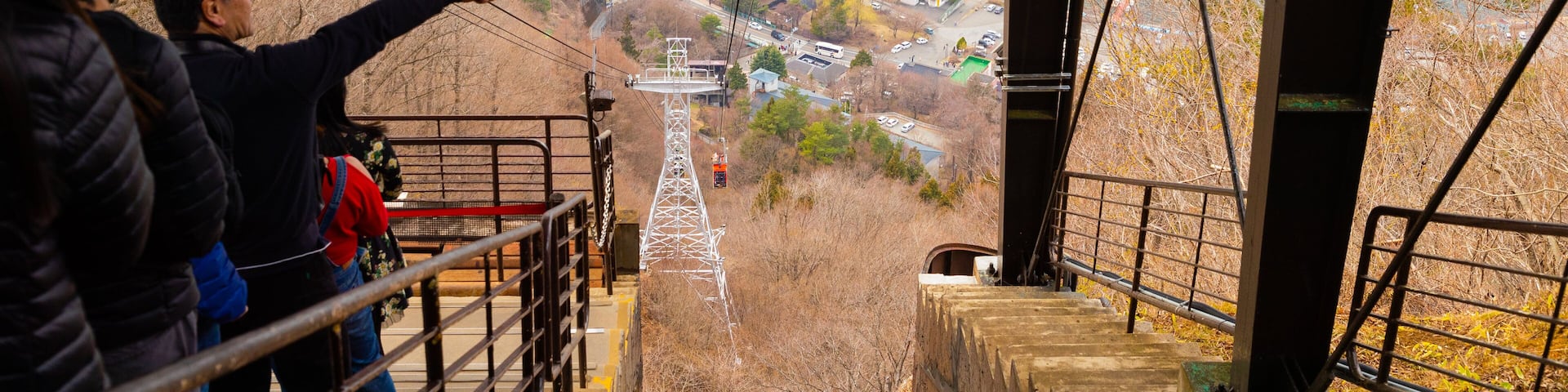 Mt. Kachi Kachi Ropeway showing a gondola as well as a small group of people