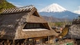 Lake Saiko Iyashi no Sato NENBA showing snow, a small town or village and mountains
