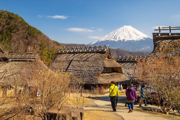 Lake Saiko Iyashi no Sato NENBA showing a small town or village as well as a couple