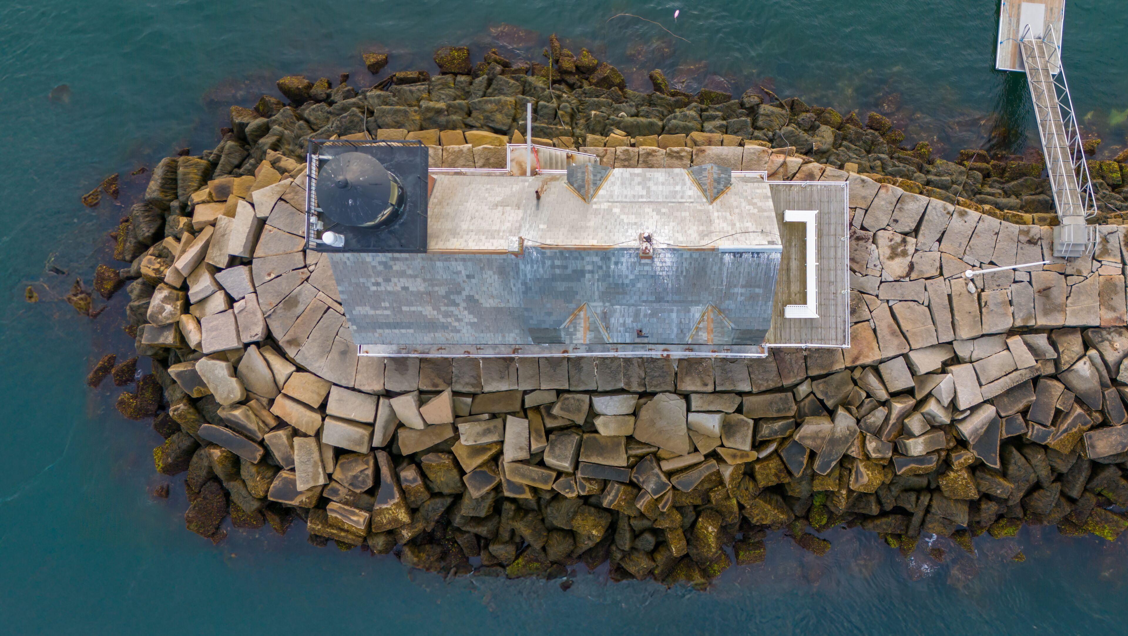 Direct overhead view of Rockland Breakwater Lighthouse in harbor on the Gulf of Maine 