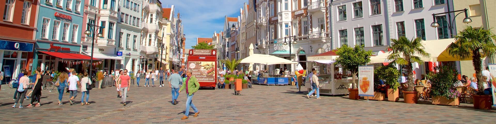 Rostock which includes street scenes and a square or plaza as well as a small group of people