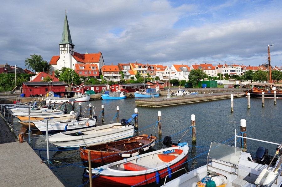 Marina and white church in Ronne, Bornholm, Denmark