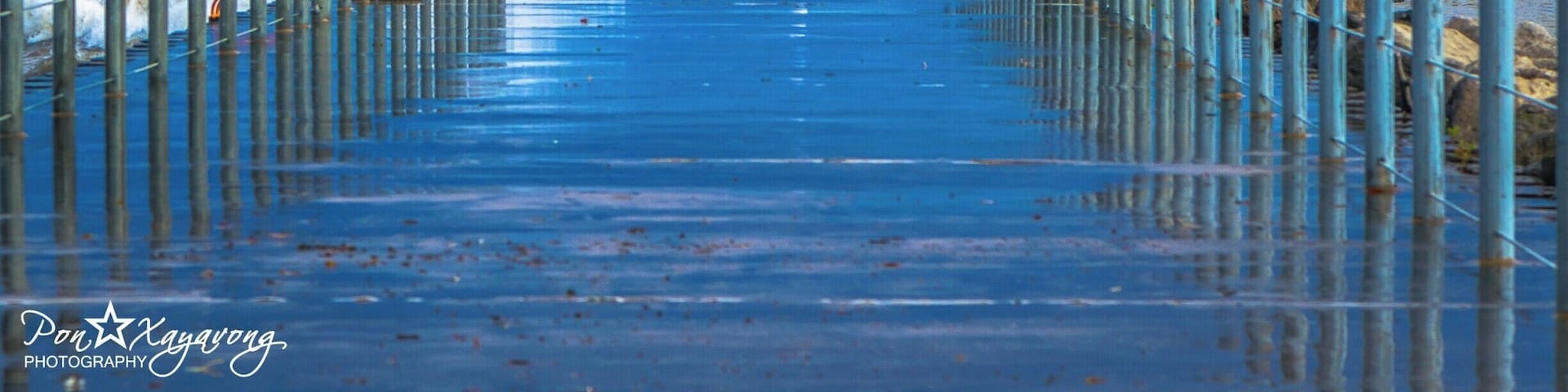 If u ever hike or walk near Ontario Beach park along the Rochester harbor ull see a lighthouse far away but be very careful because the wave from the ocean can hit u and get u wet.