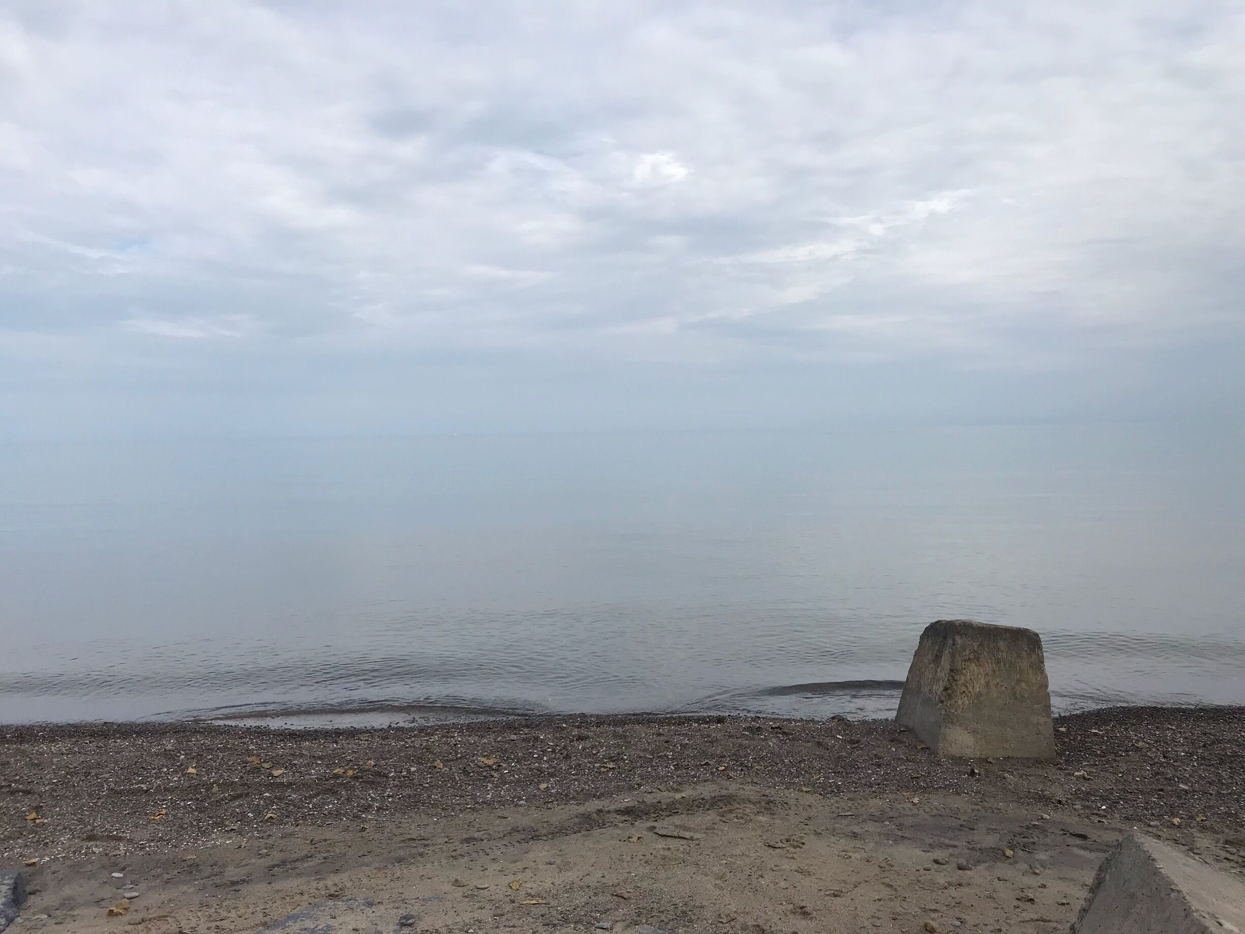 Calm waters on a cloudy day on Lake Ontario.