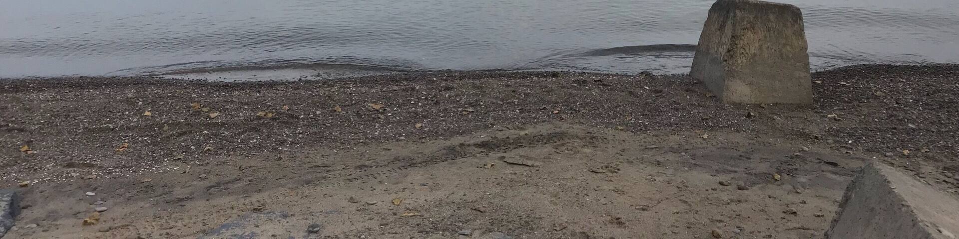 Calm waters on a cloudy day on Lake Ontario.