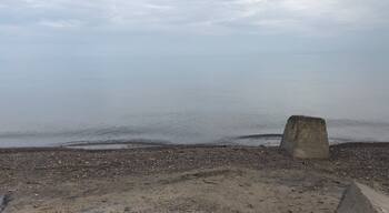 Calm waters on a cloudy day on Lake Ontario.