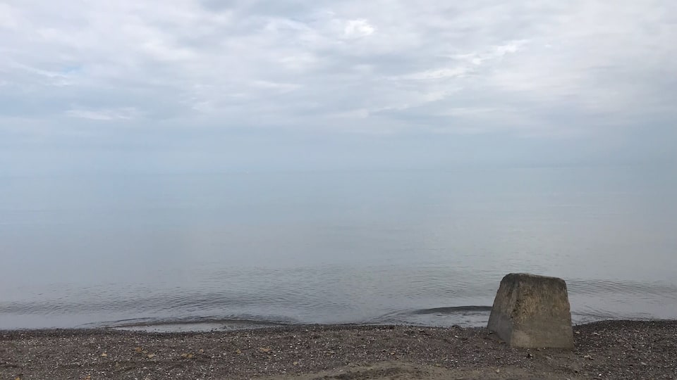 Calm waters on a cloudy day on Lake Ontario.