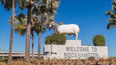 A welcome sign for Rockhampton with a large bull statue.