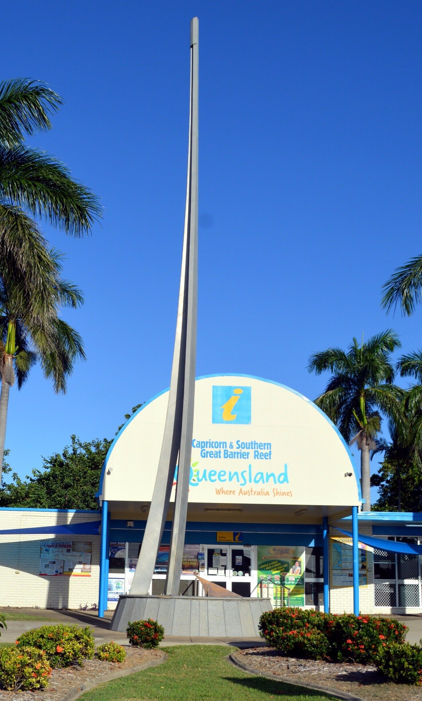 This is the invisible line that runs through Queensland.  The southern side is the 'temperate' weather and the northern side is the 'Tropics'.  
Here lies the spire to indicate this.  
An amazing place to visit.  