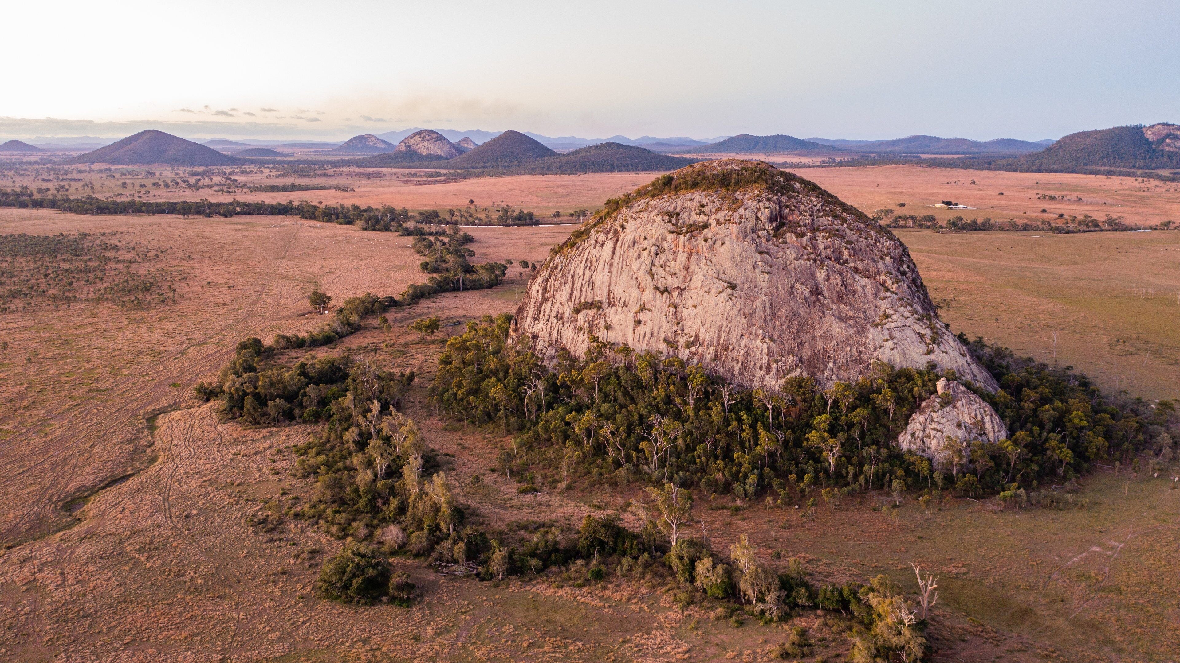 Rockhampton which includes desert views, a sunset and landscape views