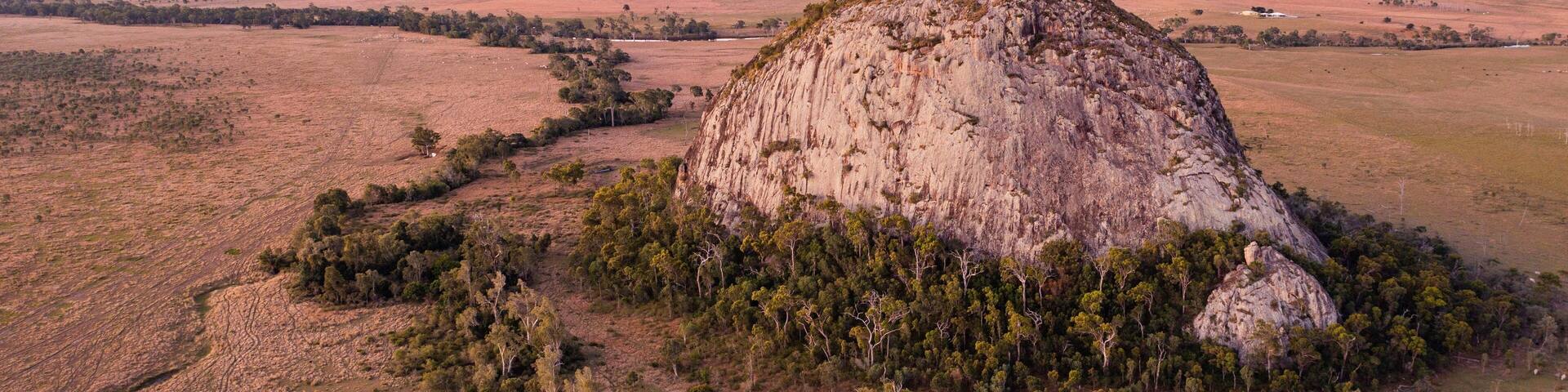 Rockhampton which includes desert views, a sunset and landscape views