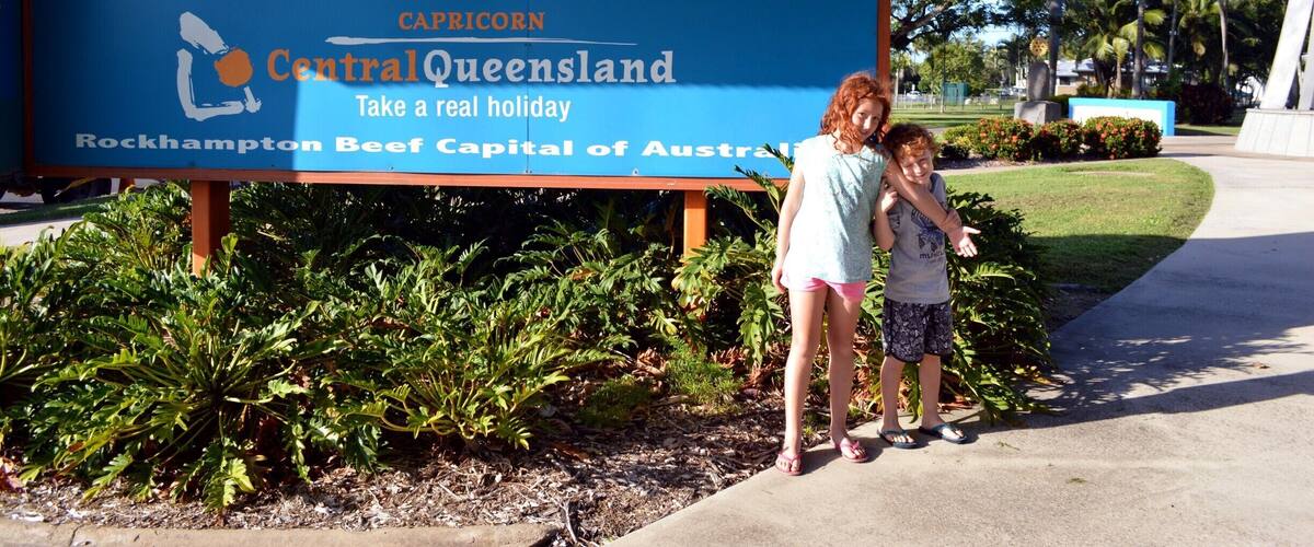 A sign with text about the Tropic of Capricorn and Central Queensland.