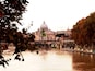 Rome is a great place to see by just walking around. There are Kodak moments everywhere! Like this spot at the banks of the river Tiber. Here you can see the St. Peter's basilica and Vatican City.