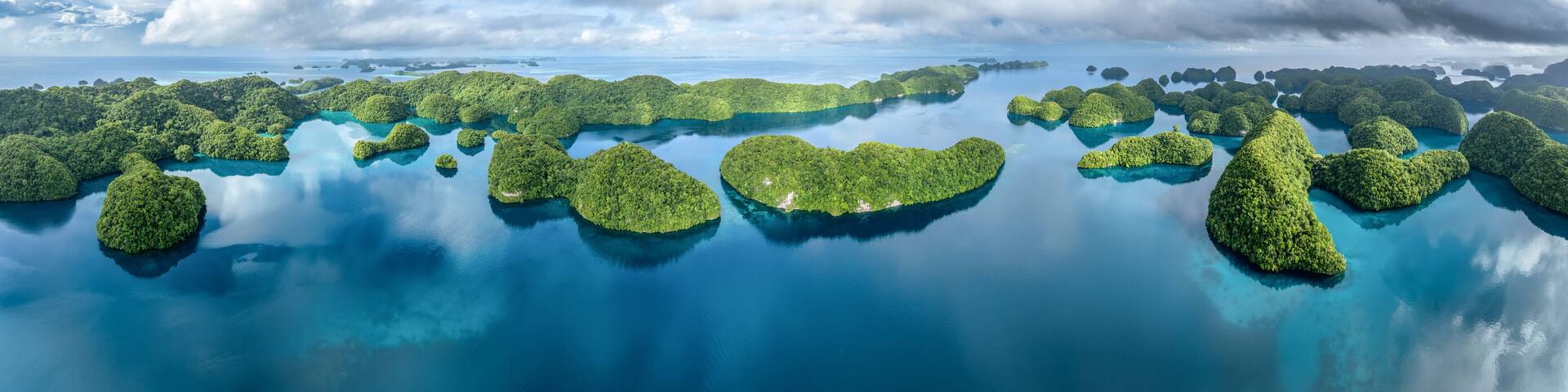 Aerial panorama of the Chelbacheb Islands also known as Rock Islands, Palau, Koror, Micronesia