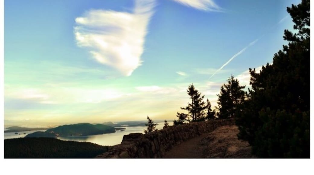 View on Mt Constitution, by far the best place to see the surrounding islands and land as far as Canada and Mt Rainier. Great place to visit. Didn't even notice the perfect music note the clouds made till I got home :)