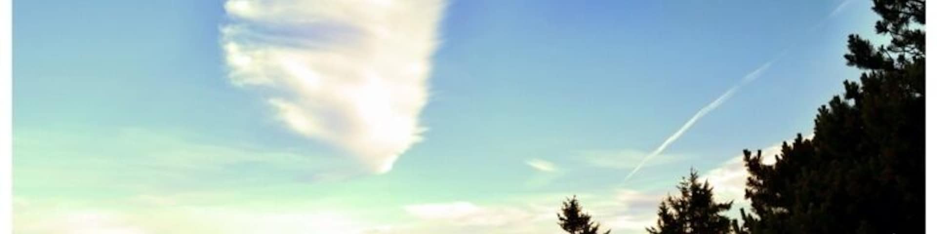 View on Mt Constitution, by far the best place to see the surrounding islands and land as far as Canada and Mt Rainier. Great place to visit. Didn't even notice the perfect music note the clouds made till I got home :)