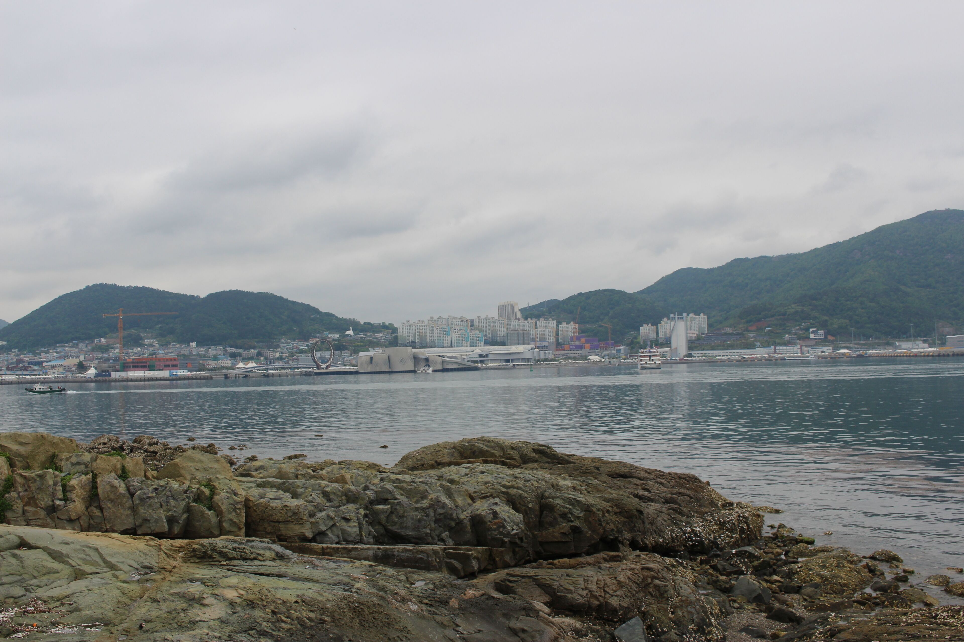 The Yeosu Port and Yeosu EXPO buildings, view from Musical Fountain of Odongdo Hallyeohaesang National Park on 2017.