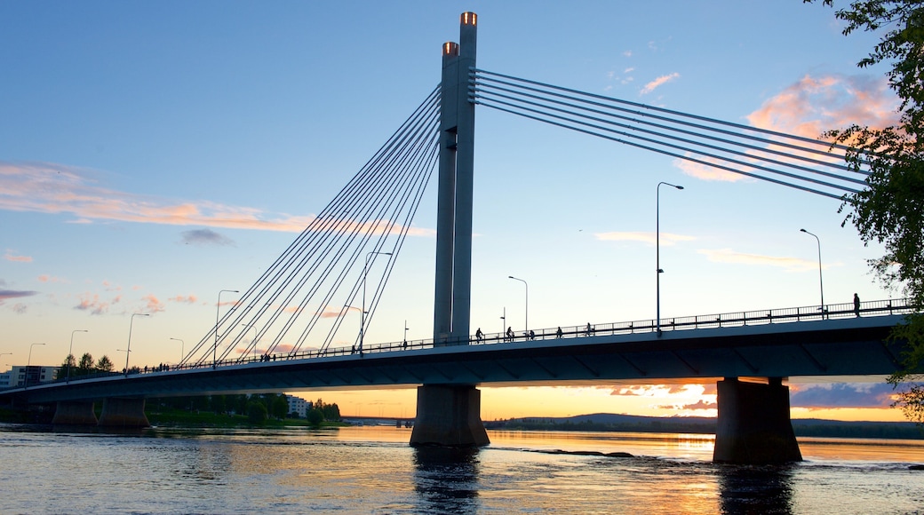 Rovaniemi which includes a sunset, a bridge and a river or creek